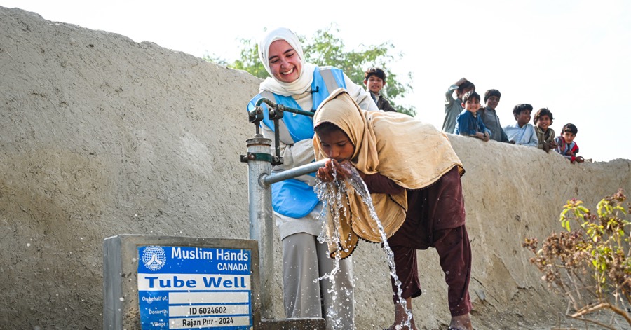 Children drink from the new tube well